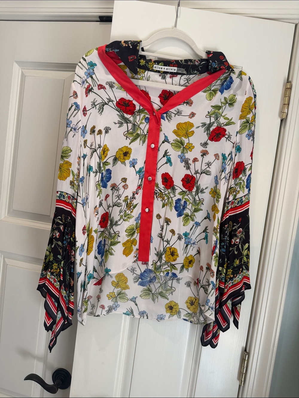 Alice + Olivia White Floral Blouse with Red Trim and Black Sleeve Panels